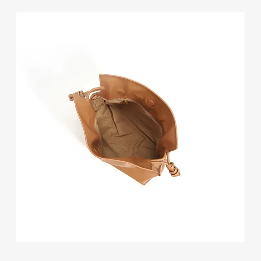 Beige Leather Drawstring Pouch Bag 2026