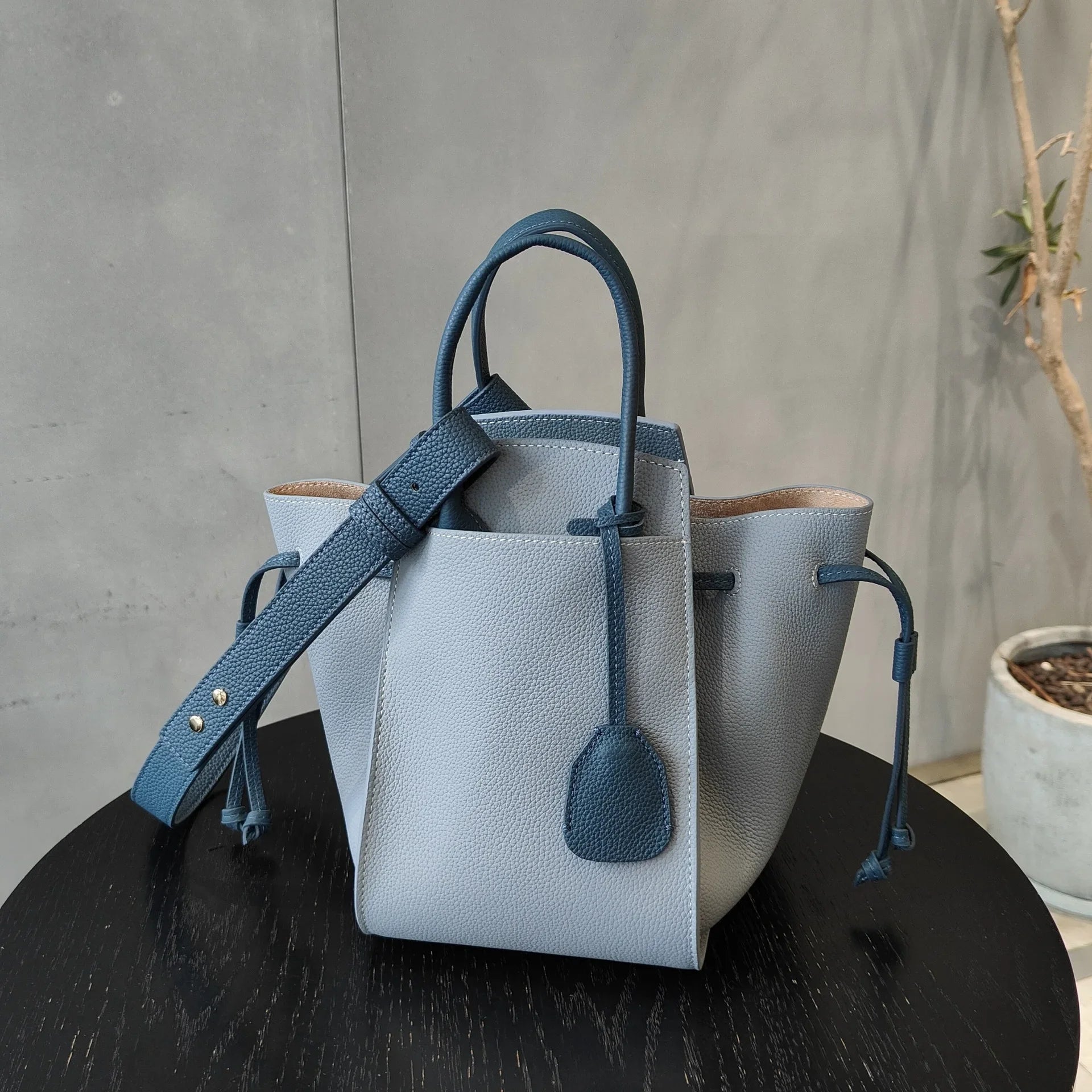 Black Leather Wings Trapeze Tote