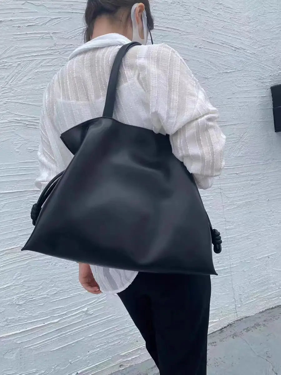 Beige Leather Drawstring Pouch Bag 2026