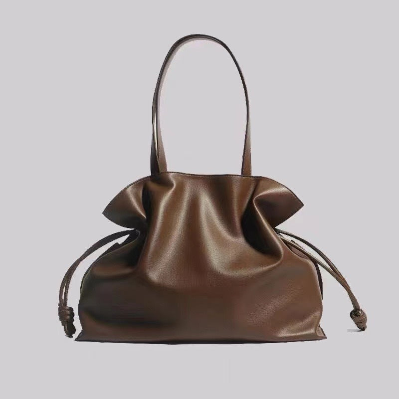 Beige Leather Drawstring Pouch Bag 2026