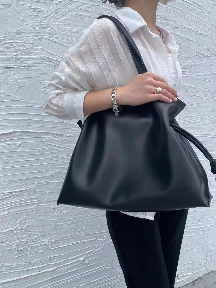 Beige Leather Drawstring Pouch Bag 2026