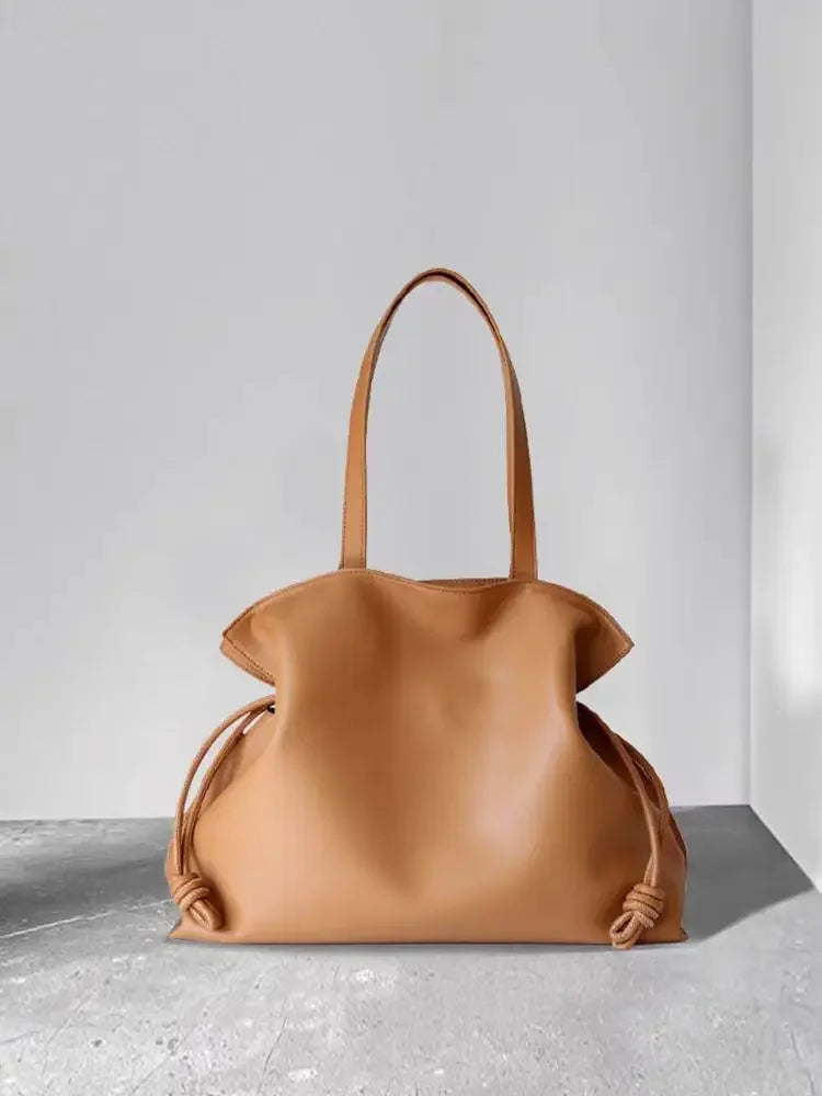 Beige Leather Drawstring Pouch Bag 2026