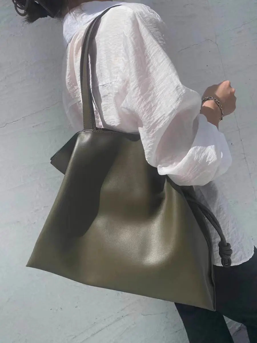 Beige Leather Drawstring Pouch Bag 2026