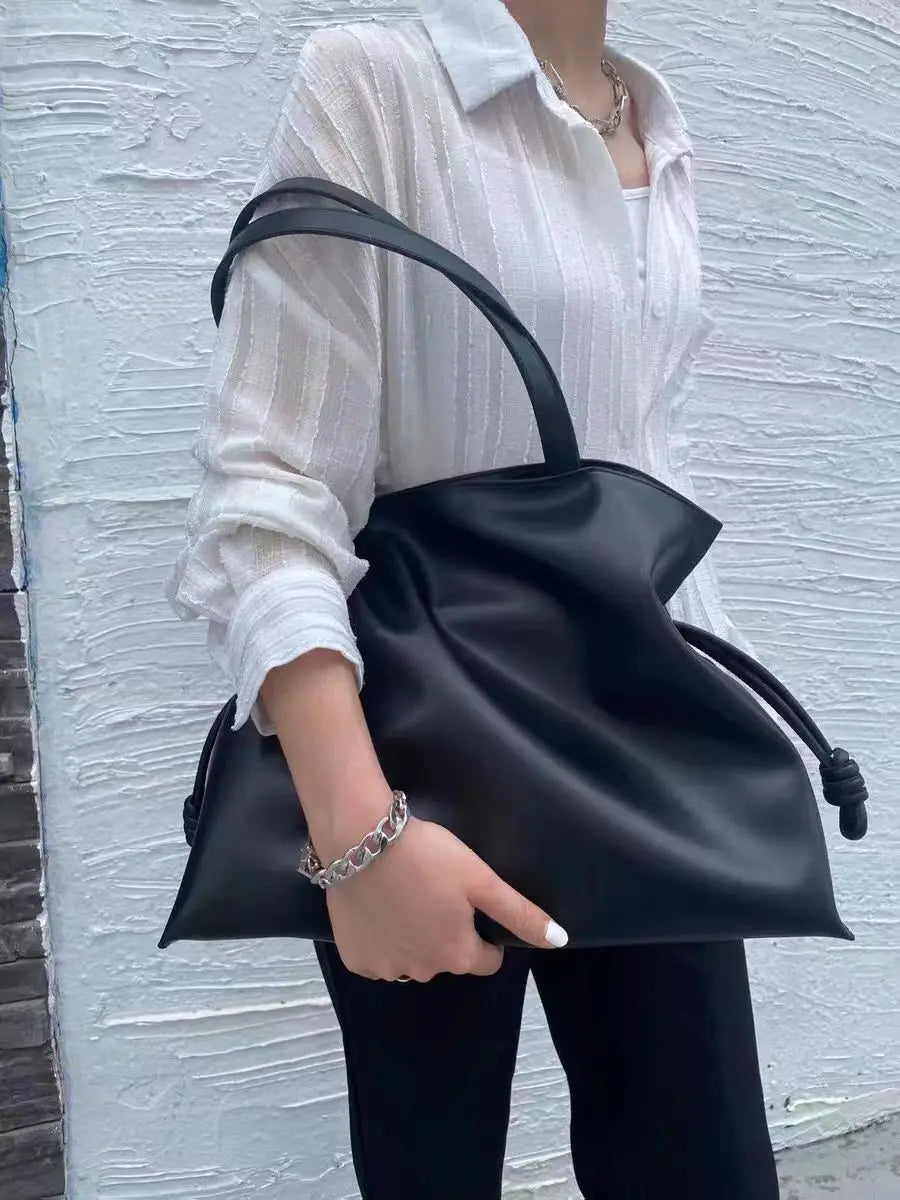 Beige Leather Drawstring Pouch Bag 2026