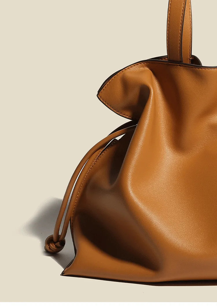 Beige Leather Drawstring Pouch Bag 2026