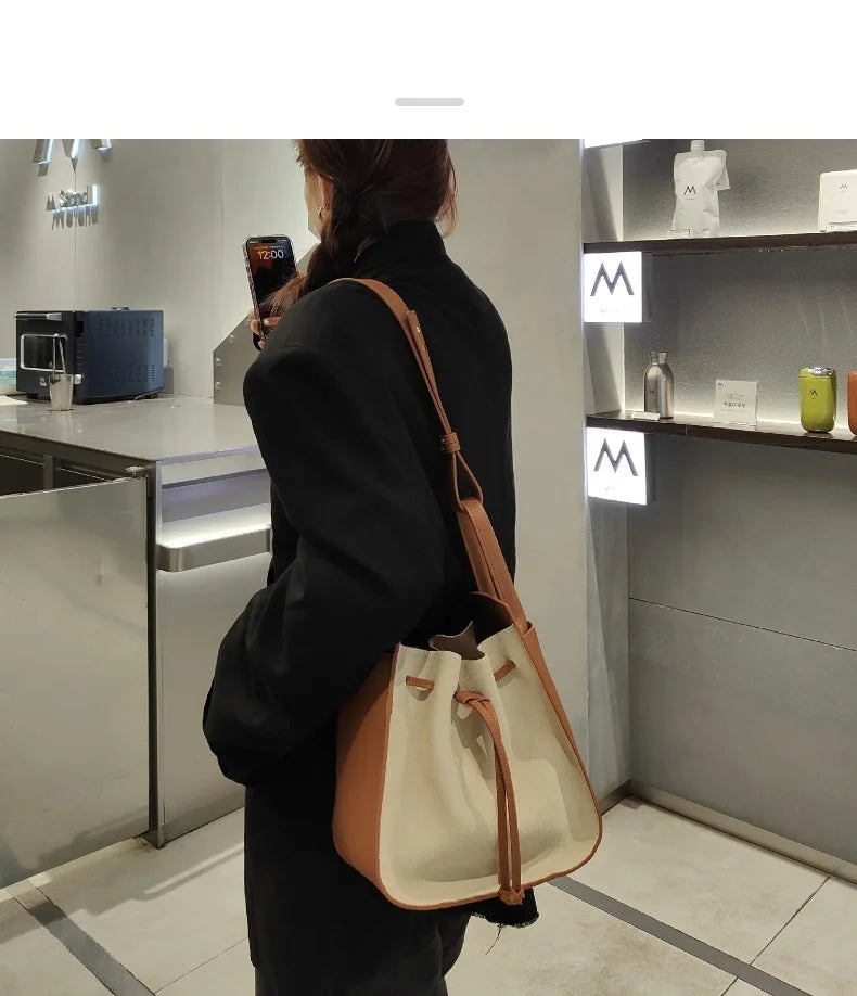 Black Leather Wings Trapeze Tote